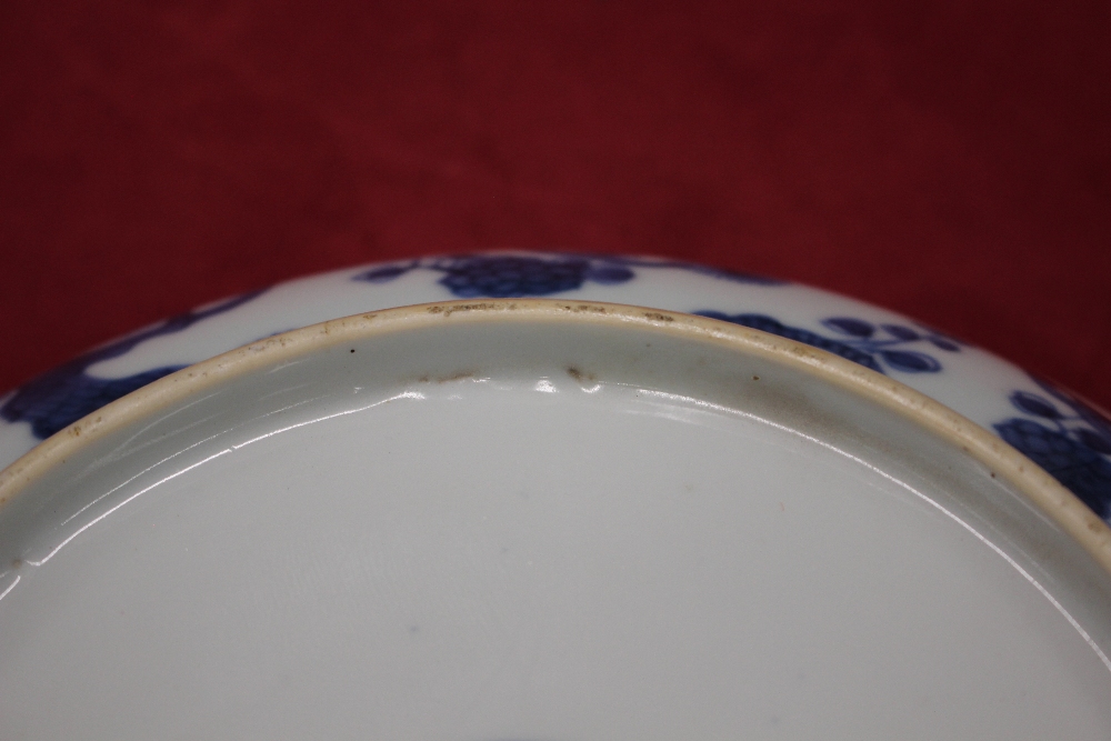 A Chinese blue and white shallow dish, the central field decorated with flowers, 20.5cm dia. six - Image 13 of 13