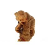 A miniature vintage Teddy Bear, 7cm high