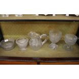 Three hob-nail cut glass pedestal urns; a heavy cut glass water jug; and an ice pail (5)