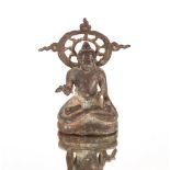 An Oriental bronze study of a seated Buddha, 10.5cm