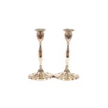 A pair of silver candlesticks, of lobed form, Birmingham 1935, 30cm high