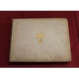 A late Victorian / Edwardian photographic album, in Velum fine binding