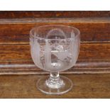 A Masonic etched glass rummer, decorated with symbols, raised on a circular spread foot, 12.5cm