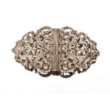 A late Victorian pierced silver nurse's buckle, having profuse foliate decoration, London 1896, by