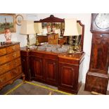 A large Victorian mahogany pedestal sideboard, of inverted breakfront form, fitted central drawer