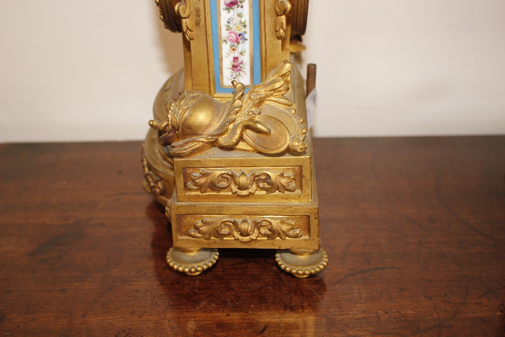 A 19th Century French gilt metal mantel clock, decorated with Sevres style porcelain panels, - Image 9 of 13