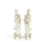 A pair of blanc de chine figures of Guanyin, 41cm high
