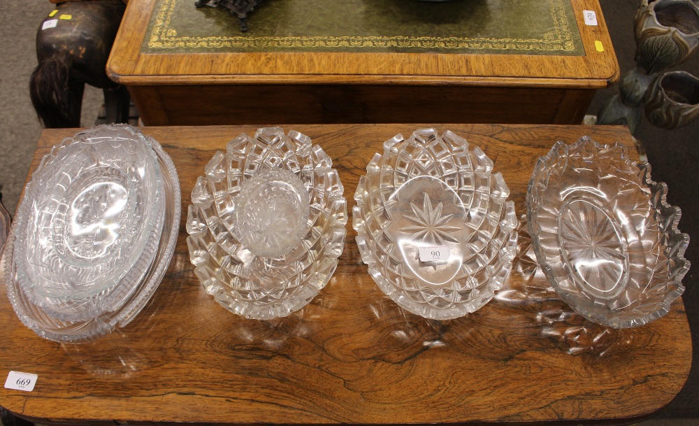 A pair of heavy Antique cut glass dishes; two similar and two cut glass serving plates