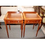 A pair of walnut and satinwood cross-banded lamp tables, fitted single drawers and raised on