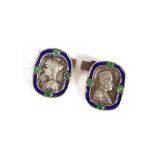 A pair of Russian white metal and enamel decorated cuff-links, with male and female head decoration