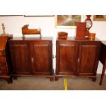 A pair of George III mahogany side cabinets, each fitted with seven oak lined dispatch box