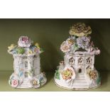 A 19th Century Coalport pastille burner, of cottage form, having detachable roof with floral