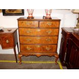 A 19th Century walnut and cross-banded bow front chest on stand, fitted two short and three long
