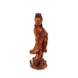 A large finely carved 19th Century Chinese hardwood figure of Guanyin, 55cm high