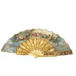 An 18th Century fan, with elaborately decorated struts painted on both sides with fine scenery