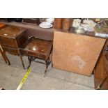 A reproduction mahogany drop leaf table and a fold