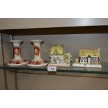 A pair of Poole Pottery Fleurie candlesticks and t