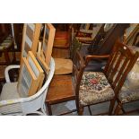 An elm seated stick back kitchen chair; a Victoria