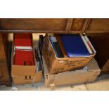 Five boxes of various books, empty photo albums et