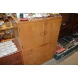 A walnut tallboy fitted three long drawers