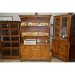 A Stag dresser fitted three drawers and cupboard b