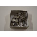 A coin bracelet; coin brooch etc.