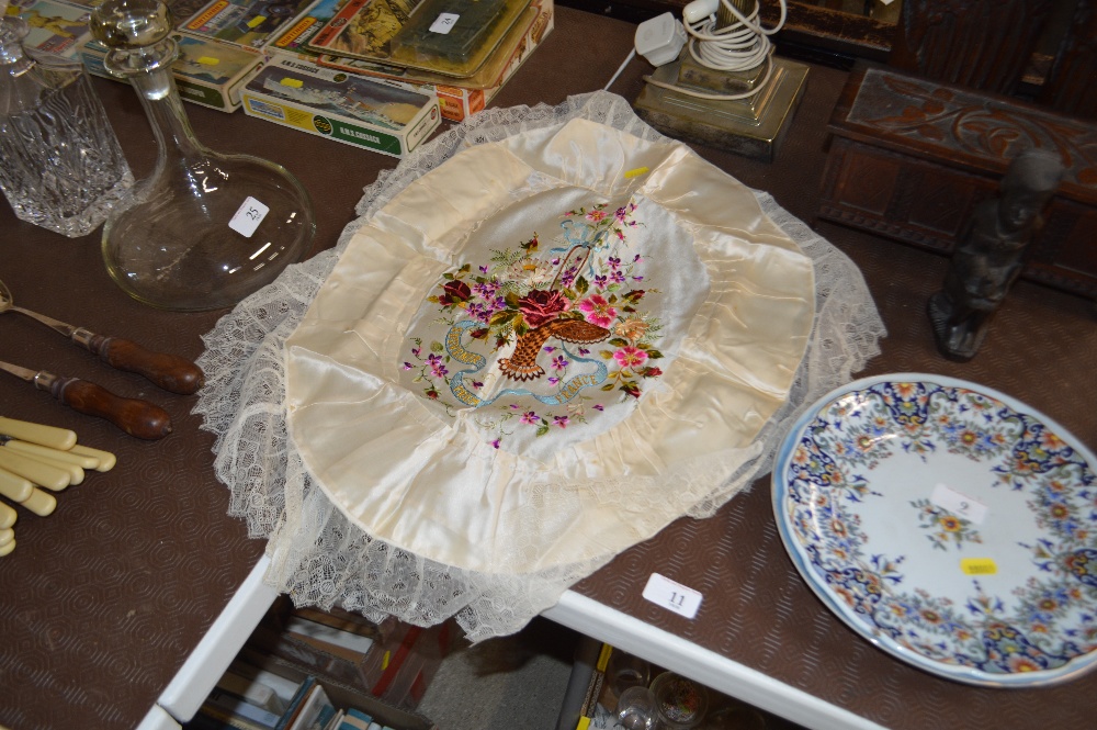 A WW1 silk work embroidery depicting a basket of f