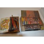 A box of artists material to include pastels and b