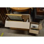 Two boxes containing various pictures and prints