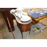 A mahogany kidney shaped dressing table with glass