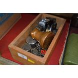 A wooden box of weights; a copper measure and a st