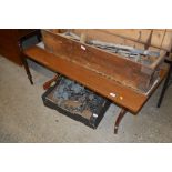 A teak tile topped oblong coffee table