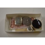 A silver Vesta case; a silver coin holder; a silve