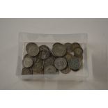 A box of various coinage to include some silver