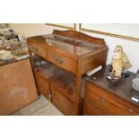 A 20th century mahogany buffet fitted two drawers