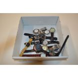 A box of various wrist watches