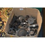 A box of old radio knobs and switches