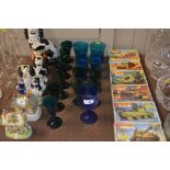 A collection of Victorian green glass wine glasses
