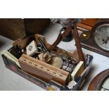 A box containing cribbage board, magnifying glasse