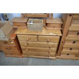 A pine chest fitted two short over three long draw