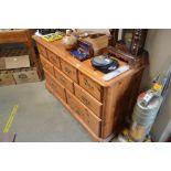 A pine multi drawer chest