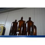 Six vintage chemist bottles