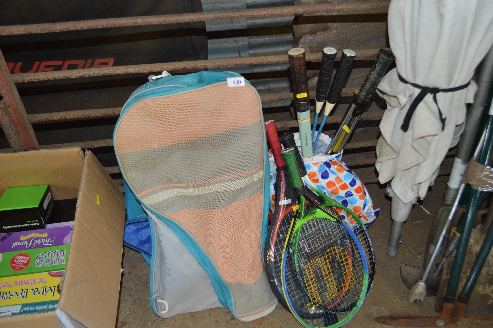 A quantity of tennis rackets and badminton rackets