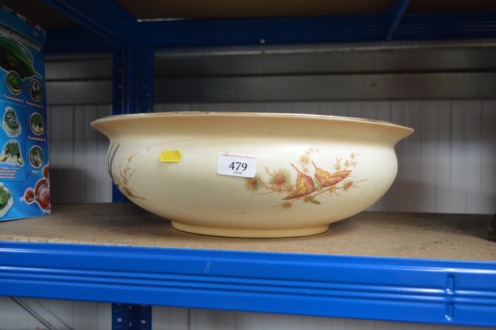 A Crown Ducal wash bowl decorated with butterflies