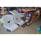 A pair of ex bowling alley chairs and table