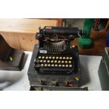 A Corona portable typewriter in fitted case