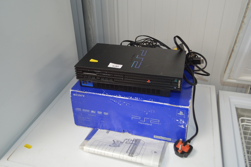 A Playstation 2 with original box