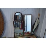 Two framed wall mirrors