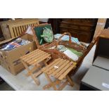 A picnic hamper and contents; and two folding stan