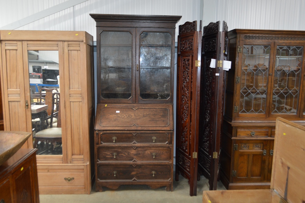 An oak 20th Century bureau bookcase